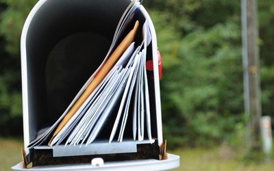 Addressed direct mail delivered to a mailbox